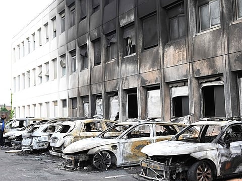 Burnt out vehicles outside the municipal building following violence in Neuilly-sur-Marne on June 29, 2023.