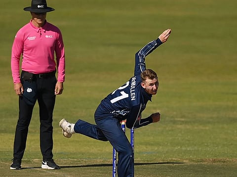 Brandon McMullen of Scotland in bowling action during the ICC Men's Cricket World Cup Qualifier Zimbabwe 2023 Super 6 match between Scotland and West Indies at Harare Sports Club on Saturday.