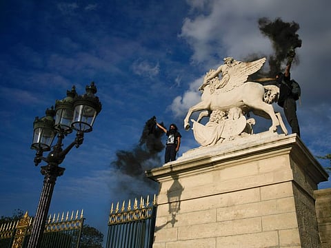 French President Emmanuel Macron urged parents on Friday to keep teenagers at home and proposed restrictions on social media to quell rioting spreading across France over the fatal police shooting of a 17-year-old driver.