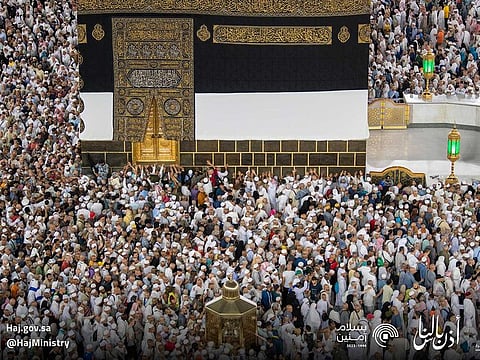 Worshippers throng the courtyard of the Grand Mosque around the Holy Kaaba.
