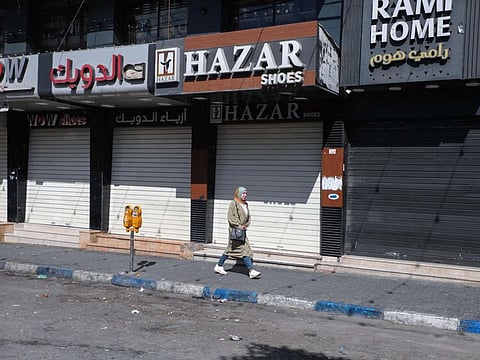 Shuttered shops during a Palestinian general strike in Hebron city in the West Bank on July 4, 2023, in protest against an ongoing Israeli military operation in Jenin city.