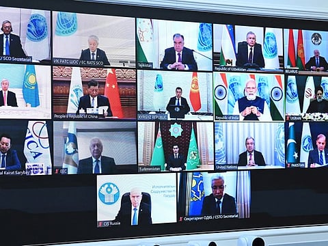 Leaders of states and officials of the Shanghai Cooperation Organisation (SCO) are seen on a screen during a summit via a video conference at the Kremlin in Moscow, Russia, July 4, 2023.