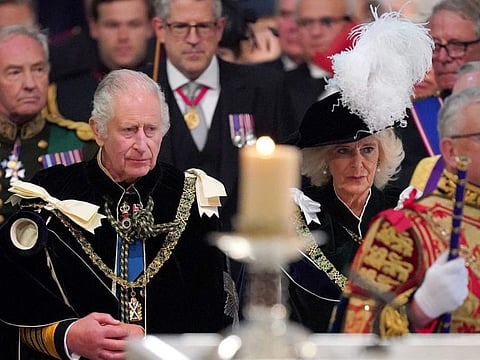 Britain's King Charles III and Britain's Queen Camilla arrive to a National Service of Thanksgiving and Dedication inside St Giles' Cathedral in Edinburgh on July 5, 2023.