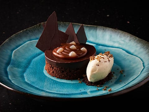 It's World Chocolate Day and we have a list of places to try out desserts. (Pictured: Truffle chocolate sacher cake from Okku).