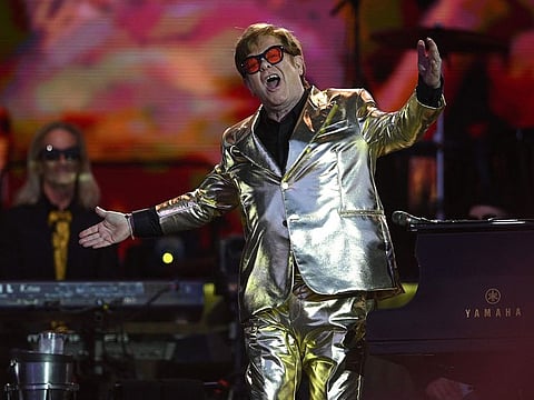 British legendary singer Elton John performs on the Pyramid Stage on day 5 of the Glastonbury festival in the village of Pilton in Somerset, southwest England, on June 25, 2023.