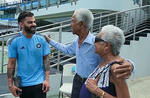 Former Indian captain Virat Kohli meets legendary West Indies cricketer Sir Garfield Sobers and his wife at the Kensington Oval in Bridgetown last week.
