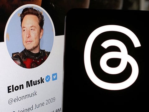 Meta Threads app logo and Elon Musk Twitter account are seen in this illustration taken, July 7, 2023.