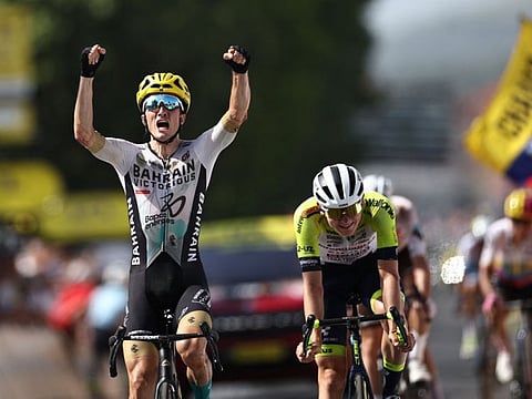 Spanish rider Pello Bilbao cycles to the finish line to win the 10th stage of the 110th edition of the Tour de France race in the Massif Central highlands in France on Tuesday