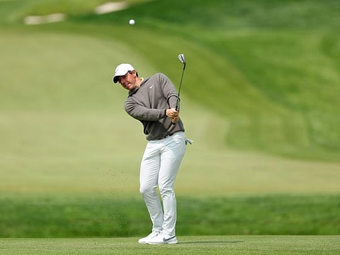 Rory McIlroy of Northern Ireland plays a shot on the tenth hole during a practice round prior to the PGA Championship at Oak Hill Country Club in May.