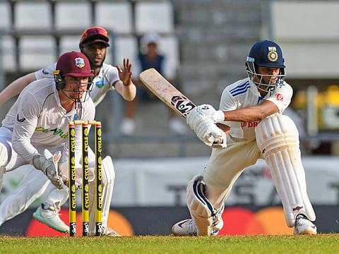 India's Yashasvi Jaiswal attempts a reverse sweep during the second day of the first Test match against West Indies at Windsor Park Stadium in Roseau on Wednesday. Jaiswal scored a century on his debut test match.