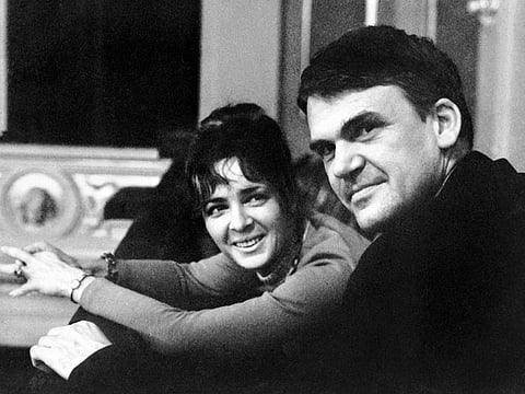 Milan Kundera poses with his wife in Prague on October 14, 1973. The noted Czech writer and the author of "The Unbearable Lightness of Being", has died aged 94.