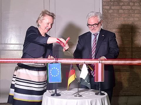 Austrian Ambassador Andrea Wicke and German Ambassador Alfred Grannas open the photo exhibition in Islamabad to mark the 70th anniversary of the first Nanga Parbat summit by the German-Austrian Expedition in July 1953.