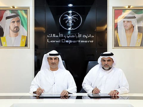 Majid Al Marri, CEO of the Real Estate Registration sector at DLD and Bader Al Gergawi, Deputy Director General of Urban Planning and Development at the Dubai Development Authority signed the agreement.