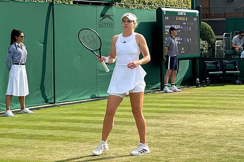 Caty McNally stands on court as her and playing partner Ashlyn Krueger, not in photo, of the United States play against Caroline Garcia of France and Luisa Stefani of Brazil in a first-round women's doubles match at Wimbledon on July 8, 2023. McNally, a 21-year-old tennis player from Ohio, was one of six of 128 entrants in women's singles at Wimbledon who has a female coach, about 5%. The women's professional tennis tour hopes to increase the number of women coaching at the sport's top level and has started a program to help aspiring coaches get there. (AP Photo/Howard Fendrich)