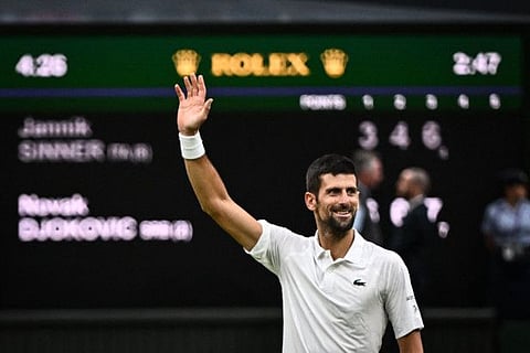 Serbia's Novak Djokovic celebrates after winning against Italy's Jannik Sinner during their men's singles semi-finals at Wimbledon Championships on Friday.