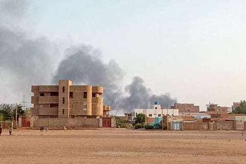 Smoke billows in the distance around the Khartoum Bahri district amid ongoing fighting on July 14, 2023.