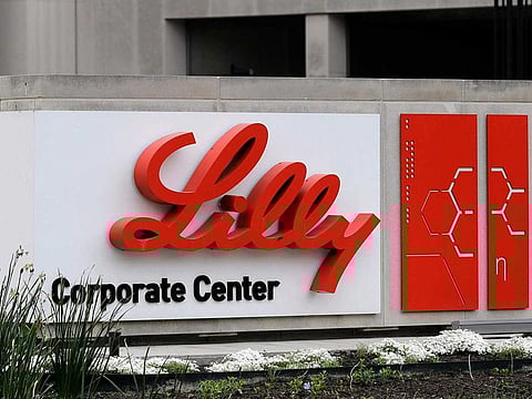 A sign for Eli Lilly & Co. sits outside their corporate headquarters in Indianapolis on April 26, 2017.