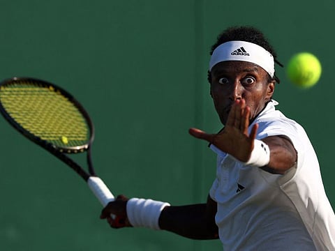 Sweden's Mikael Ymer in action against Colombia's Daniel Elahi Galan during their men's singles match at The All England Tennis Club in Wimbledon in last week.