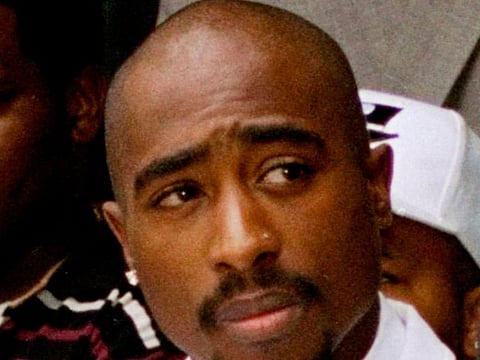 Rapper Tupac Shakur attends a voter registration event in South Central Los Angeles, Aug. 15, 1996.