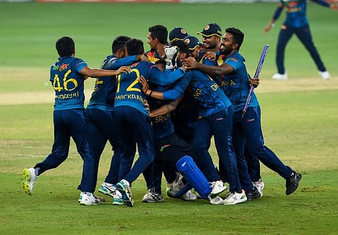 Sri Lankan team celebrate their win over Pakistan in the Asia Cup final at Dubai International cricket stadium in 2022.