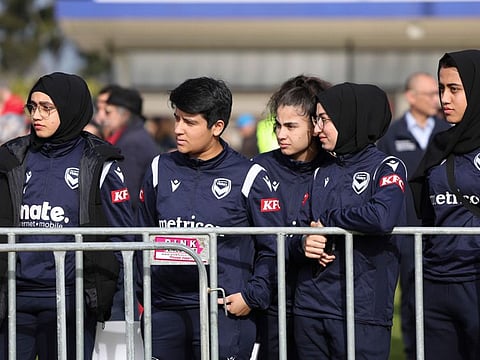Members of the Afghan women's football team attend Morocco's practice ahead of the Women's World Cup in Melbourne, Australia on Wednesday.