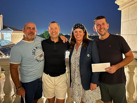 Thursday Curry Club Winners Photo - Richard Green and David Warham alongside Adam Stastny, Assistant Golf Services Manager at Jumeirah Golf Estates and Lady Captain Evelyn Downham
