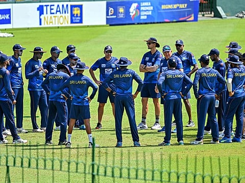 Sri Lanka's coach Chris Silverwood speaks with players during a practice session at the Sinhalese Sports Club International Cricket Stadium in Colombo on Sunday.