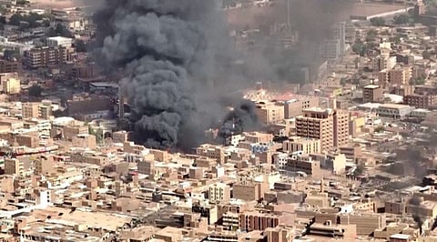 FILE PHOTO: An aerial view of the black smoke and flames at a market in Omdurman, Khartoum North, Sudan, May 17, 2023 in this screengrab obtained from a handout video.