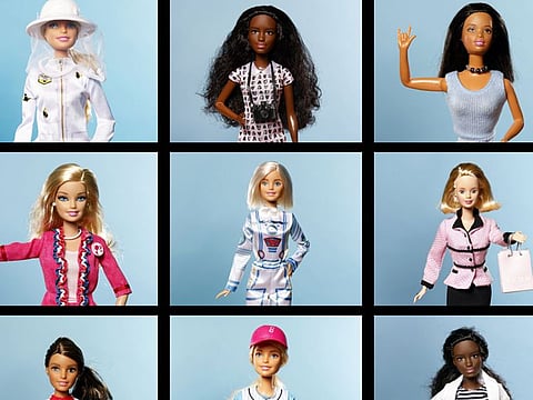 Beekeeper Barbie, Pet Photographer Barbie and Sign Language Barbie. MIDDLE ROW FROM LEFT: President Barbie, Astronaut Barbie and Avon Representative Barbie. BOTTOM ROW FROM LEFT: Chef Barbie, Baseball Player Barbie and Doctor Barbie.