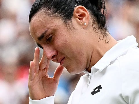 Tunisia’s Ons Jabeur cries after receiving the runner-up prize following her defeat in the women’s singles tennis final against Czech Republic’s Marketa Vondrousova in the 2023 Wimbledon Championships in London on July 15, 2023. It was Jabeur’s third loss in a grand slam final.