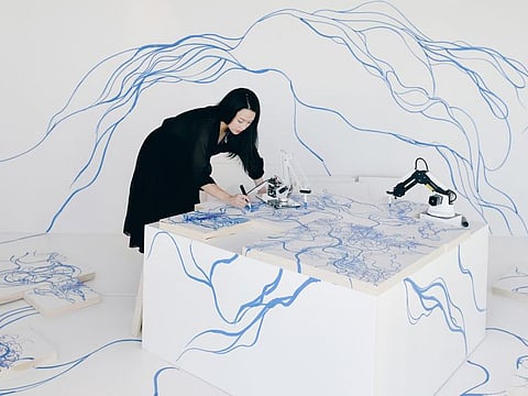 Sougwen Chung, during Drawing Operations Duet (Performance), 2018 Miami Art Basel