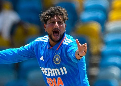 Kuldeep Yadav of India celebrates the dismissal of Yannic Cariah of West Indies during the first One Day International at Kensington Oval in Bridgetown on Thursday.