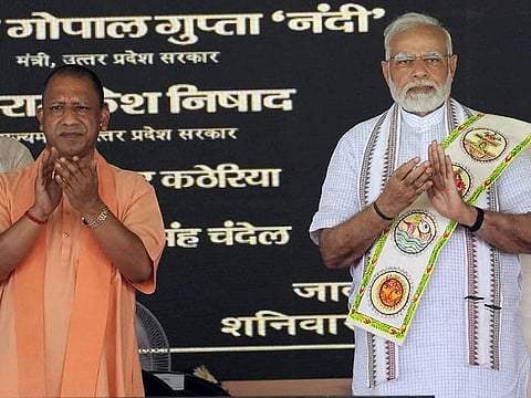 India's Prime Minister Narendra Modi with Uttar Pradesh Chief Minister Yogi Adityanath in Jalaun, UP