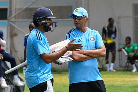 Rohit Sharma and Rahul Dravid of India chat during a training session at Kensington Oval in Bridgetown on July 26.