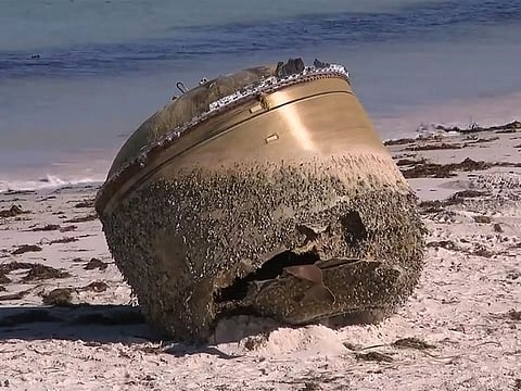 The bulky barnacle-encrusted cylinder was first spotted in mid-July near remote Jurien Bay.