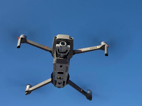 A Chinese DJI made drone holds a demonstration to display an app that tracks a drone's registration and owner in Montreal.