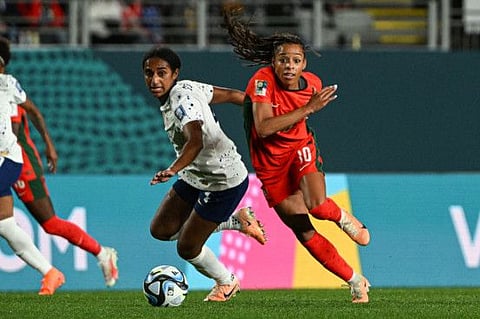 USA's defender Naomi Girma and Portugal's forward Jessica Silva (right) vie for the ball during the Women's World Cup Group E match at Eden Park in Auckland on Tuesday.