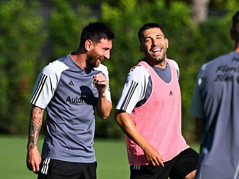 Inter Miami's new Spanish defender Jordi Alba (right) and teammate Argentine forward Lionel Messi speak during training at the Florida Blue Training Centre in Fort Lauderdale, Florida on Tuesday.