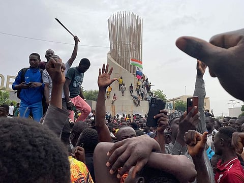Supporters of the Nigerien defence and security forces gather during a demonstration outside the national assembly in Niamey on July 27, 2023