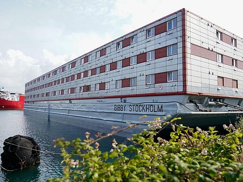 The Bibby Stockholm accommodation barge is docked in Portland, on the southwest coast of England on July 21, 2023.. The Bibby Stockholm barge moored in Dorset’s Portland Port is expected to house 500 asylum-seekers. The UN refugee agency condemned the passage of the government’s Illegal Migration Bill as a “breach of international law” and warned it would expose refugees to “grave risks”.