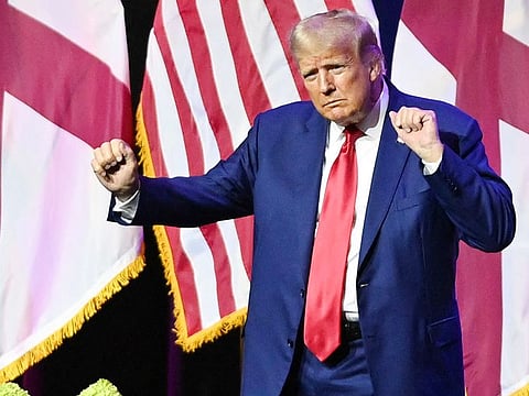 Donald Trump dances on stage during the Alabama Republican Party’s 2023 Summer meeting at the Renaissance Montgomery Hotel on August 4, 2023 in Montgomery, Alabama.