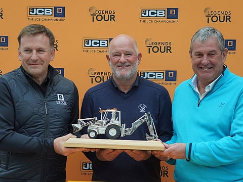 Peter Baker (centre) 2023 JCB Championship winner with Graeme McDonald, JCB Group CEO & Phil Harrison, Legends Tour CEO