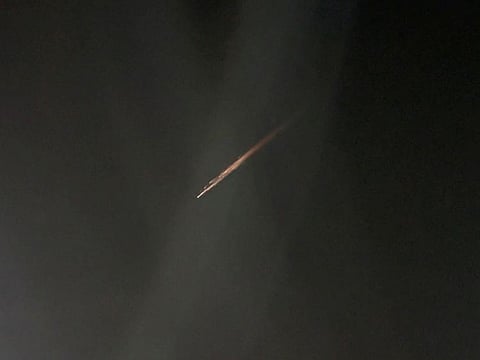 A streak of light, which the Australian Space Agency (ASA) identified as the probable remnants of a Russian rocket, is seen in the night sky, in Melbourne, Victoria.