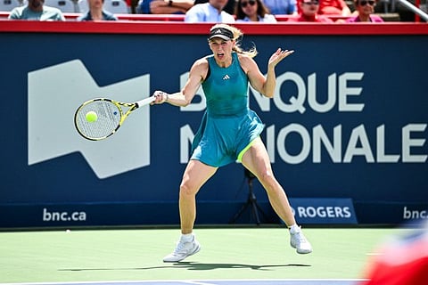 Caroline Wozniacki of Denmark hits a return against Kimberly Birrell of Australia on second day during the National Bank Open at Stade IGA on Tuesday.