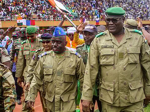 Members of a military council that staged a coup in Niger attend a rally at a stadium in Niamey, Niger, August 6, 2023