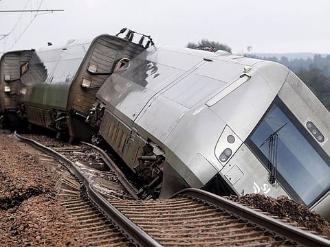 This photo taken on August 7, 2023 shows a derailed passenger train between Iggesund and Hudiksvall in Sweden. Three people have been taken to hospital, according to the police.