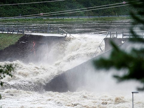 The dam at Braskereidfoss bursts as the water flows down Glomma River, in Braskereidfoss, Norway.