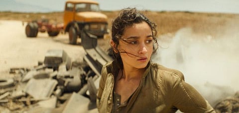 This image released by Netflix shows Alia Bhatt in a scene from "Heart of Stone." (Netflix via AP)