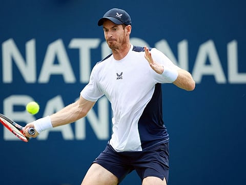 Andy Murray of Great Britain powers a forehand return against Lorenzo Sonego of Italy during the National Bank Open at Sobeys Stadium on Monday.
