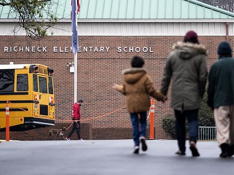File photo: Students return to Richneck Elementary in Newport News, Virginia. In the moments after a 6-year-old shot his teacher in a Virginia classroom this past January, the child made statements to a reading specialist like, “I shot that (expletive) dead,” according to police search warrants that were unsealed in July.